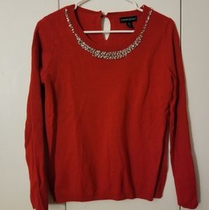Red sweater with crystal neckline